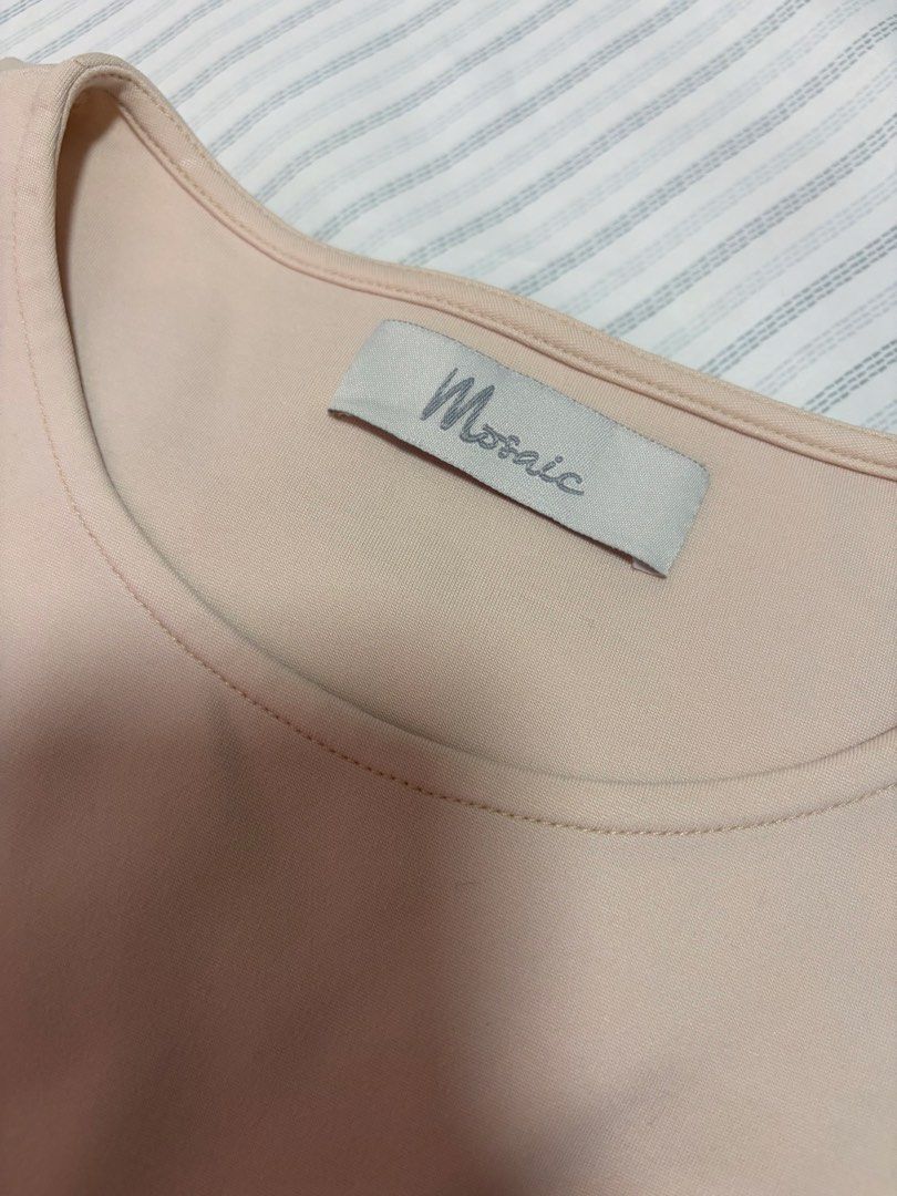 Authentic Mosaic Beige Top (Category: Blouses) located in Quezon City. Submitted by mnl.declutter (Listing ID 1443024650, Image 3). Description: Authentic Mosaic Beige Top •in great condition •fits S-XL •color is similar with 3rd pic Size guide •width ≈ 20.5 in •length ≈ 20 in •sleeve length ≈ 8.5 in DM for any questions or inquiries! 😊 MOP - Gcash SF - c/o buyer.