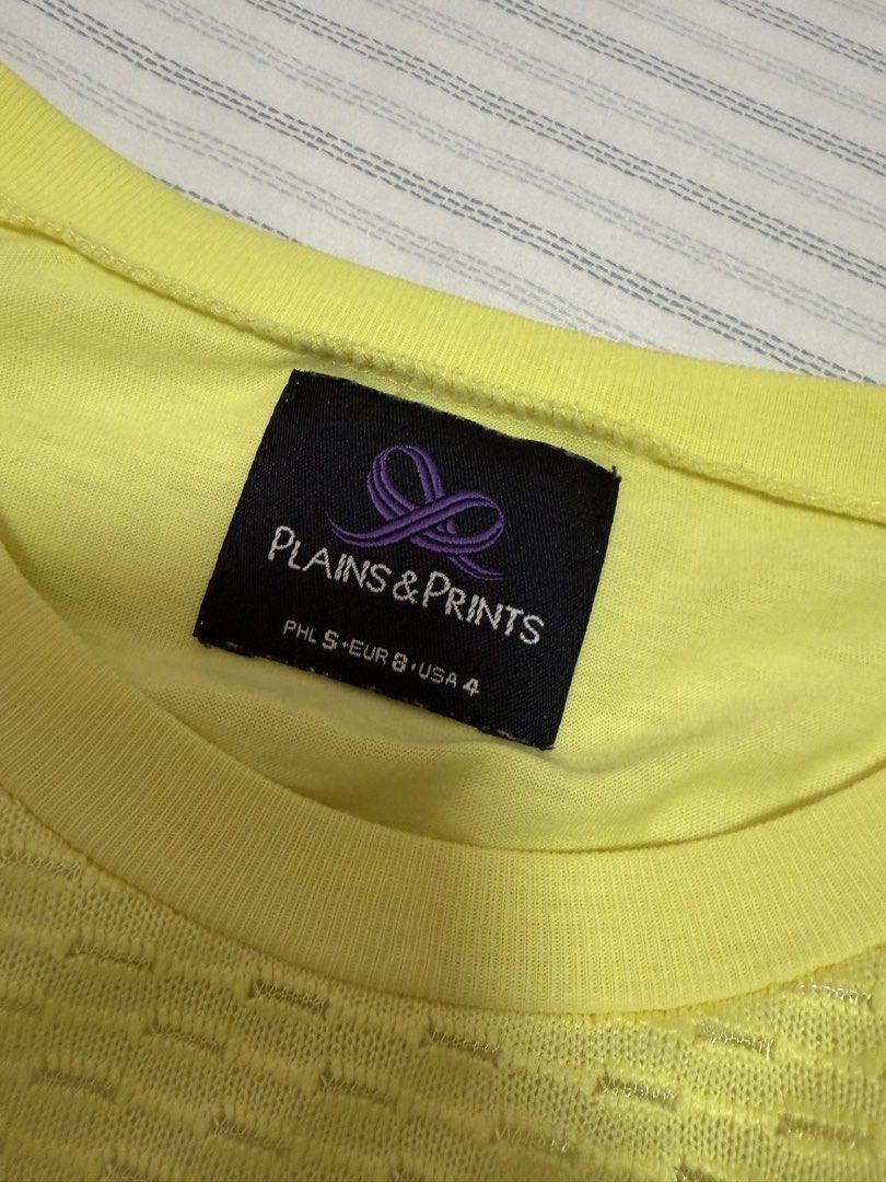 Authentic Plains & Prints Yellow Top (Category: Shirts) located in Quezon City. Submitted by mnl.declutter (Listing ID 1443023621, Image 3). Description: Authentic Plains & Prints Yellow Top •in good condition •has small flaw on 4th pic Size guide •shoulder width ≈ 13.5 in •width ≈ 16 in •length ≈ 21.5 in •sleeve length ≈ 4.5 in DM for any questions or inquiries! 😊 MOP - Gcash SF - c/o buyer.