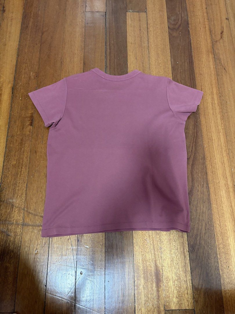 Authentic Uniqlo Fuchsia Crew Neck Tee (Category: Shirts) located in Quezon City. Submitted by mnl.declutter (Listing ID 1443025572, Image 2). Description: Authentic Uniqlo Fuchsia Crew Neck Tee •in good condition Size guide •shoulder width ≈ 14.5 in •width ≈ 18.5 in •length ≈ 22 in •sleeve length ≈ 5.5 in DM for any questions or inquiries! 😊 MOP - Gcash SF - c/o buyer.
