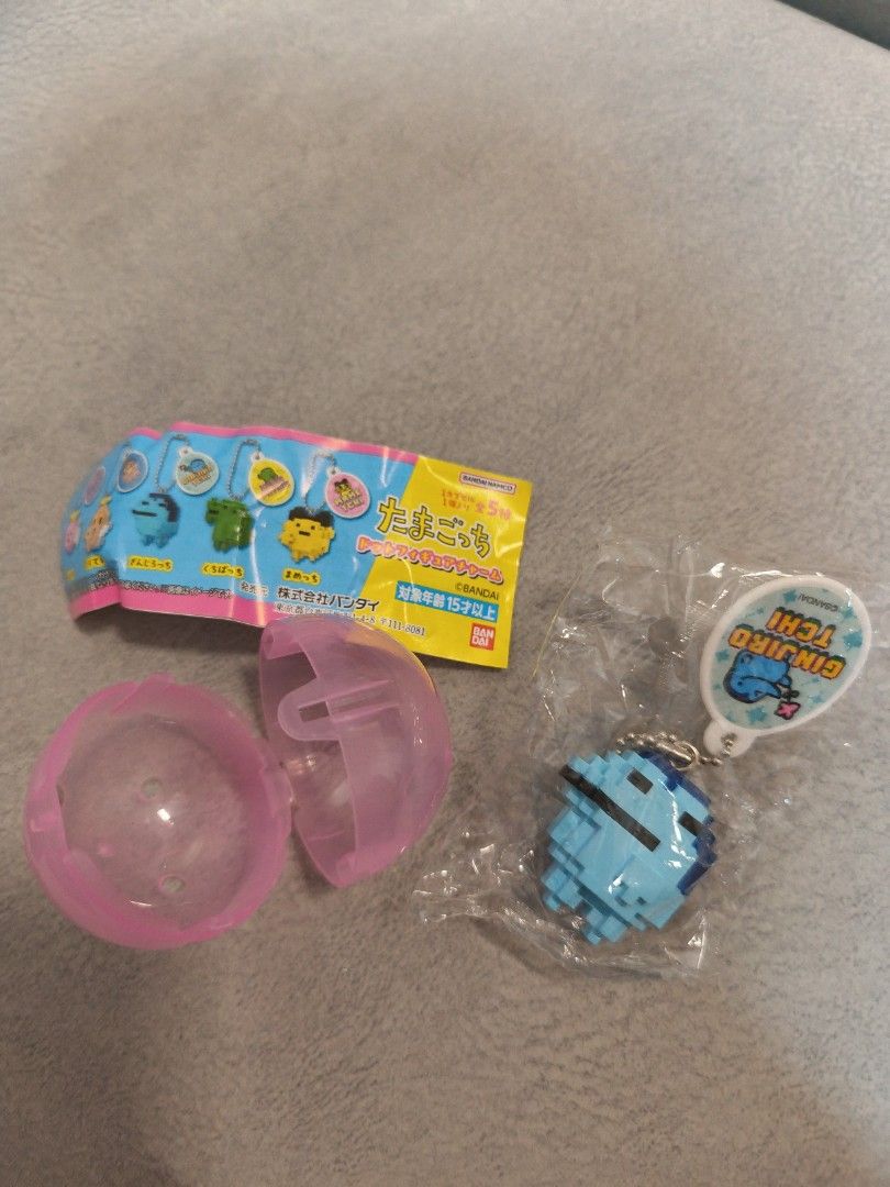Bandai Tamagotchi Dot Figure Charm Keychain (Category: Character Goods) located in Singapore. Submitted by kenyousmile (Listing ID 1443050235, Image 2). Description: WTT Ginjirotchi / Maruten to Mametchi / Kuriten or WTS @ $4 each 😊 Item is still in original packaging with the capsule and pamphlet! 😊.
