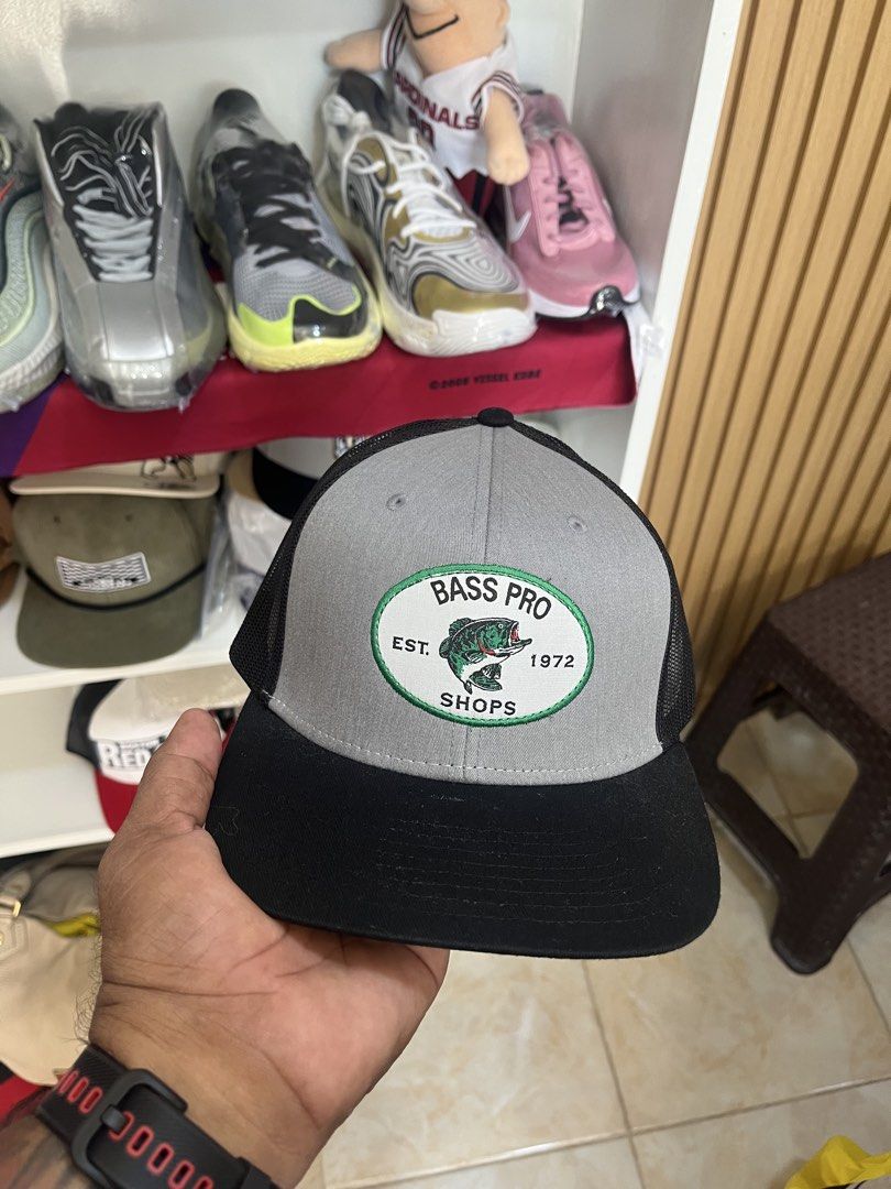 Bass Pro Shops Trucker Hats - Various Designs (Category: Caps & Hats) located in Pinamalayan. Submitted by chay0921 (Listing ID 1443048105, Image 2). Description: - Brand: Bass Pro Shops Trucker Hats - Features: Mesh back, adjustable strap - Designs Available: American flag, fish logo, 'Est. 1972' - Ideal for: Fishing trips, casual wear - Get yours today!.