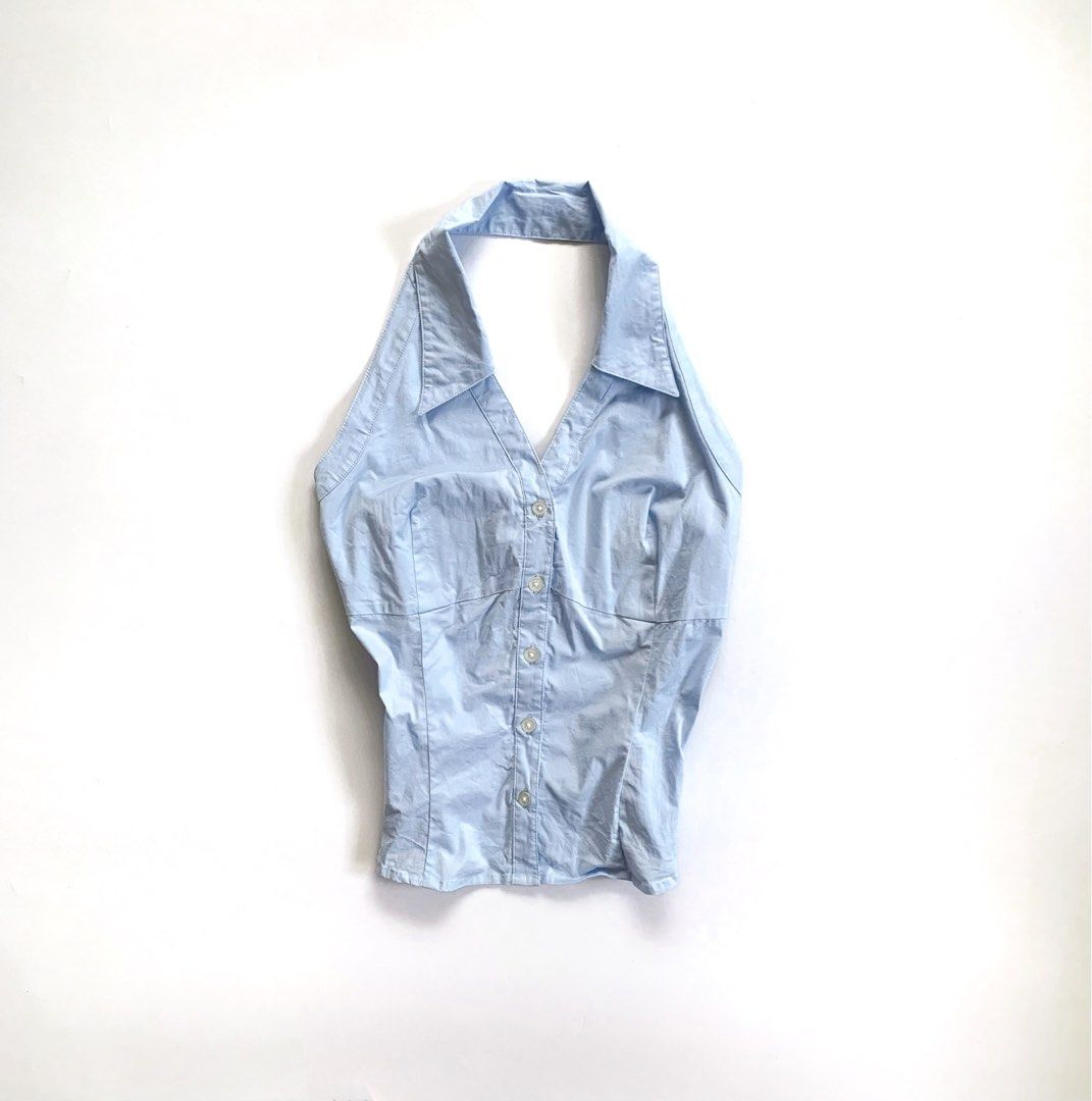 BCBG Max Azria Light Blue Halter Button-Up Shirt Size 8 (Category: Blouses) located in Tarlac. Submitted by luv__vintage (Listing ID 1443053218, Image 2). Description: - Brand: BCBG Max Azria - Color: Light Blue - Style: Halter Top - Neckline: Collared - Closure: Button-up front - Fit: Fitted - Size: 8 - Occasion: Great for a night out or a casual day..