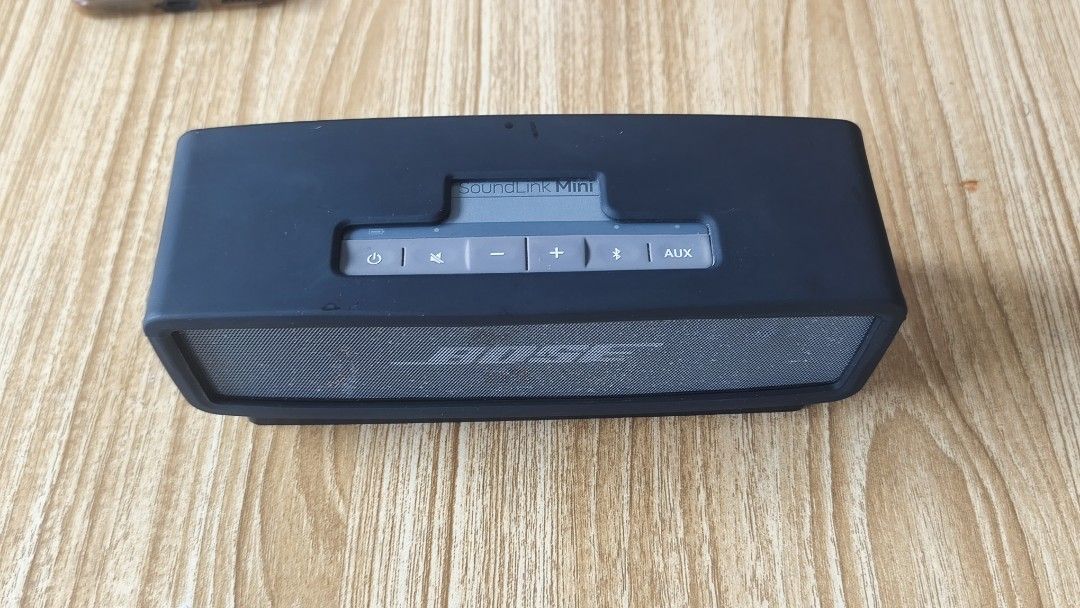 Bose SoundLink Mini Bluetooth Speaker with Charger and Dock (Category: Portable Music Players) located in Quezon City. Submitted by herrera_jekjek (Listing ID 1442950658, Image 2). Description: Selling a Bose SoundLink Mini portable speaker. Comes with the charging dock and power adapter. Connects via Bluetooth. Great sound quality for its size. Tested and working. Some minor dust visible on the speaker grille and casing. Selling as it's no longe