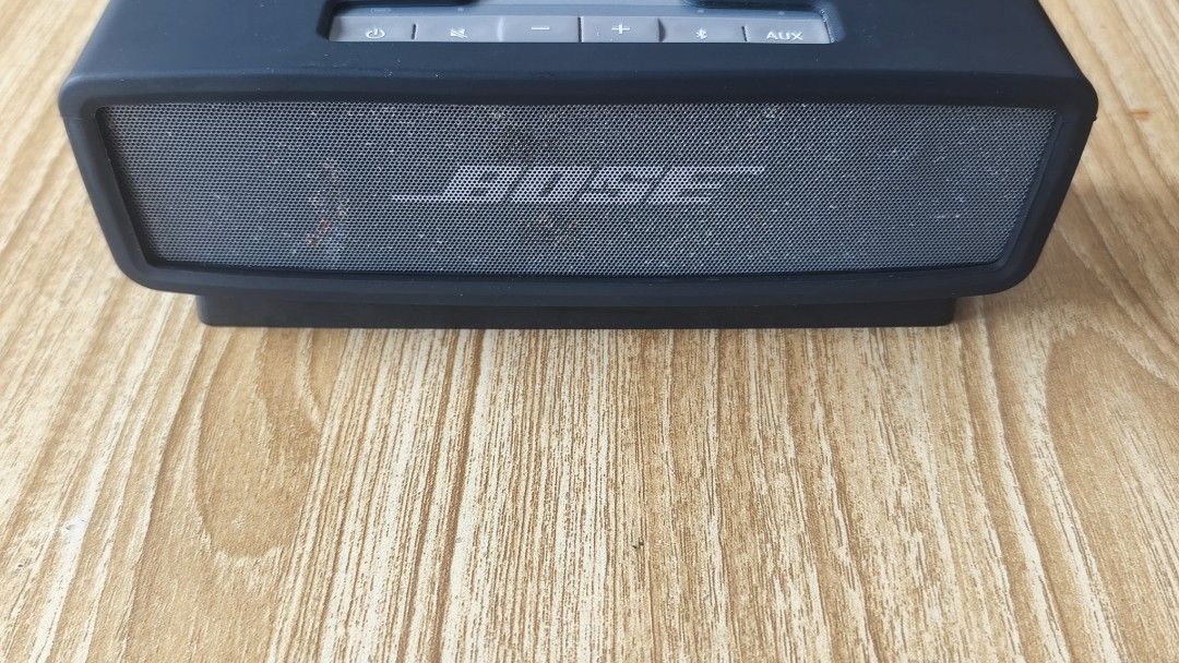 Bose SoundLink Mini Bluetooth Speaker with Charger and Dock (Category: Portable Music Players) located in Quezon City. Submitted by herrera_jekjek (Listing ID 1442950658, Image 3). Description: Selling a Bose SoundLink Mini portable speaker. Comes with the charging dock and power adapter. Connects via Bluetooth. Great sound quality for its size. Tested and working. Some minor dust visible on the speaker grille and casing. Selling as it's no longe