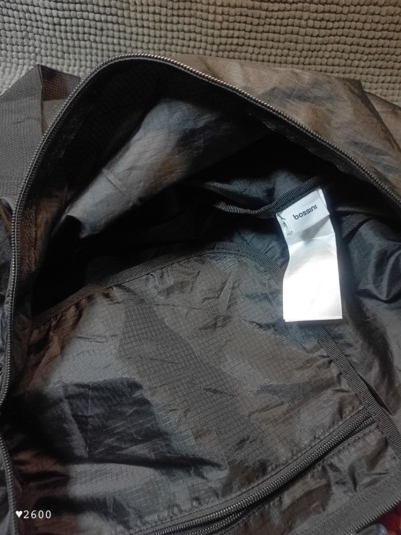 Bossini Foldable Bag (Category: Tote Bags) located in Baguio. Submitted by 26_zerozero (Listing ID 1443120249, Image 3). Description: Excellent Condition | no flaws - Brand: Bossini - Color: Black - Type: Foldable Bag - Dimensions: W48 x D25 x H25 cm - Ideal for: Travel or everyday use - Features: Lightweight, easy to pack.