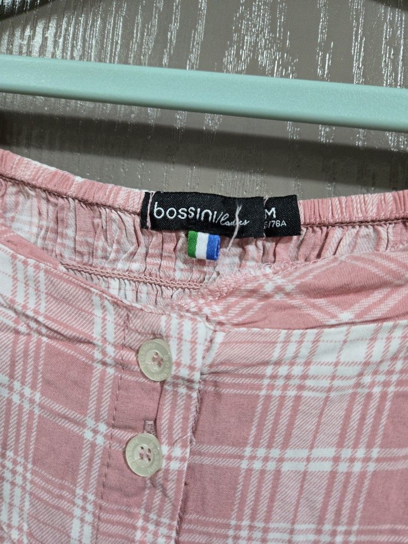 Bossini Pink Plaid Button-Up Shirt Size M (Category: Shirts) located in Rizal. Submitted by marrenkeithly (Listing ID 1443082513, Image 2). Description: - Bossini Pink & White Plaid Shirt - Size: Medium (M) - Short sleeves - Button-up front - Side gathering detail - Perfect for casual wear.