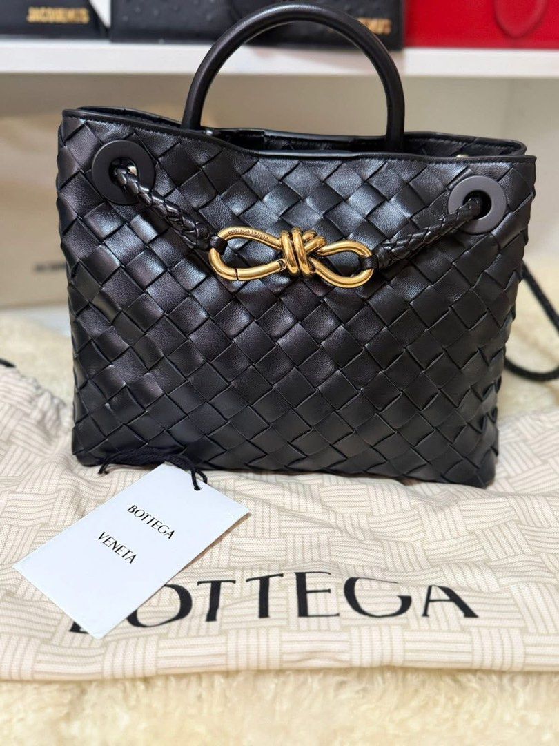 Bottega Veneta Andiamo (Category: Luxury Bags & Wallets) located in Manila. Submitted by jangmi93 (Listing ID 1443079439, Image 1). Description: - Authentic Bottega Veneta mini bag - Color: Black - Material: Intrecciato weave leather - Signature gold knot detail - Includes dust bag carecard, tag, and authenticity certfication Guaranteed Authentic Moneyback if proven fake Still nego..