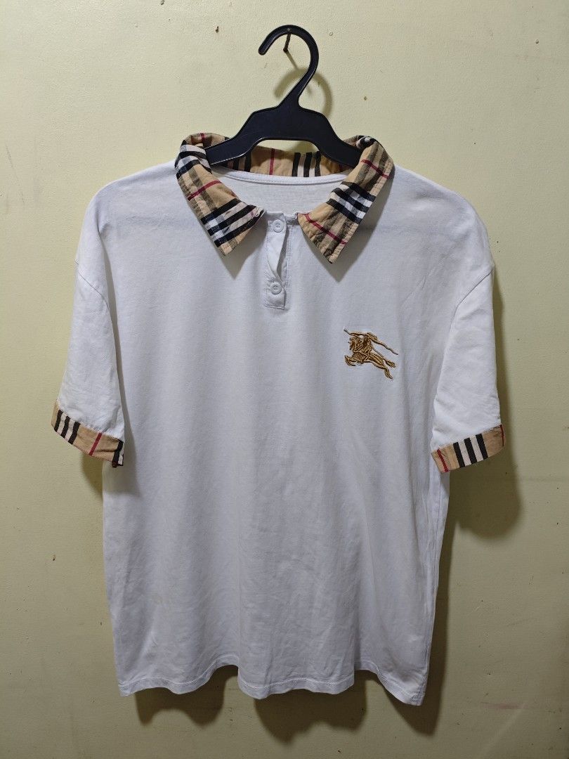 Burberry Classic Unisex Polo Shirt (Category: Everything Else Others) located in Baguio. Submitted by jayjay_apparel01 (Listing ID 1443100747, Image 1). Description: Burberry Classic Unisex Polo Shirt Color Rate 9.8/10 Embroidered Logo Like New Cotton Tela Size Medium Dimes 20 Width 25 Length Price P220.
