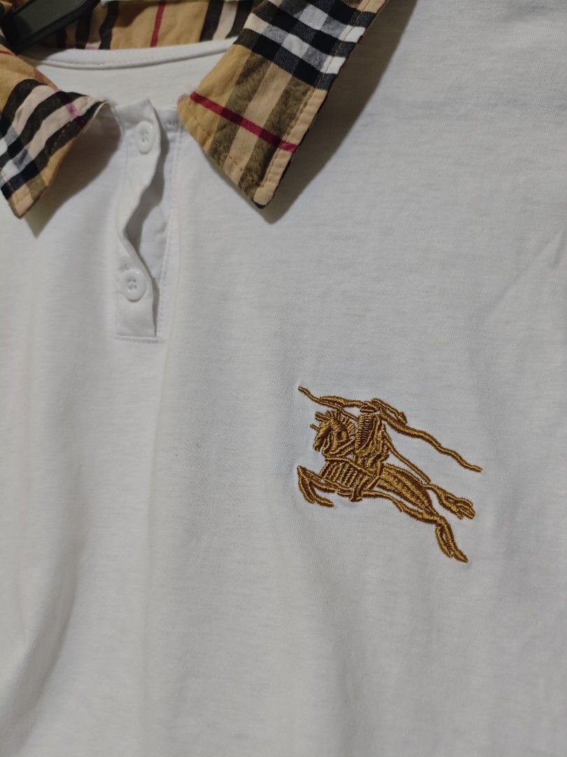 Burberry Classic Unisex Polo Shirt (Category: Everything Else Others) located in Baguio. Submitted by jayjay_apparel01 (Listing ID 1443100747, Image 3). Description: Burberry Classic Unisex Polo Shirt Color Rate 9.8/10 Embroidered Logo Like New Cotton Tela Size Medium Dimes 20 Width 25 Length Price P220.