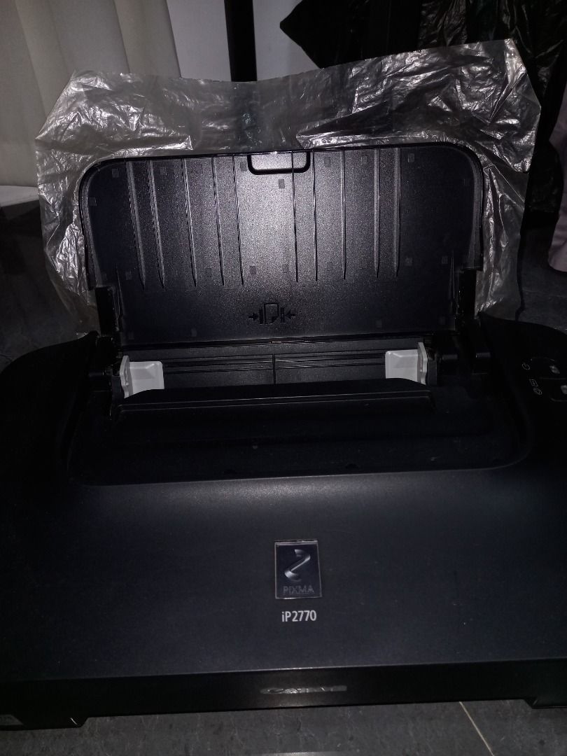 Canon PIXMA iP2770 Printer (Category: Printers, Scanners & Copiers) located in Cavite. Submitted by thriftiesie (Listing ID 1442955909, Image 1). Description: - Canon PIXMA iP2770 printer - Color: Black - Top cover is open and covered with plastic wrap - Sold as is -working but with no cartridge -negotiable.