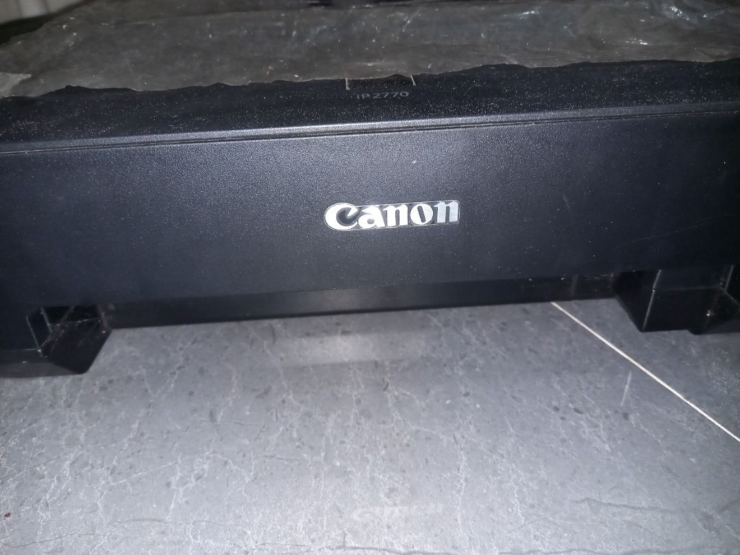 Canon PIXMA iP2770 Printer (Category: Printers, Scanners & Copiers) located in Cavite. Submitted by thriftiesie (Listing ID 1442955909, Image 2). Description: - Canon PIXMA iP2770 printer - Color: Black - Top cover is open and covered with plastic wrap - Sold as is -working but with no cartridge -negotiable.