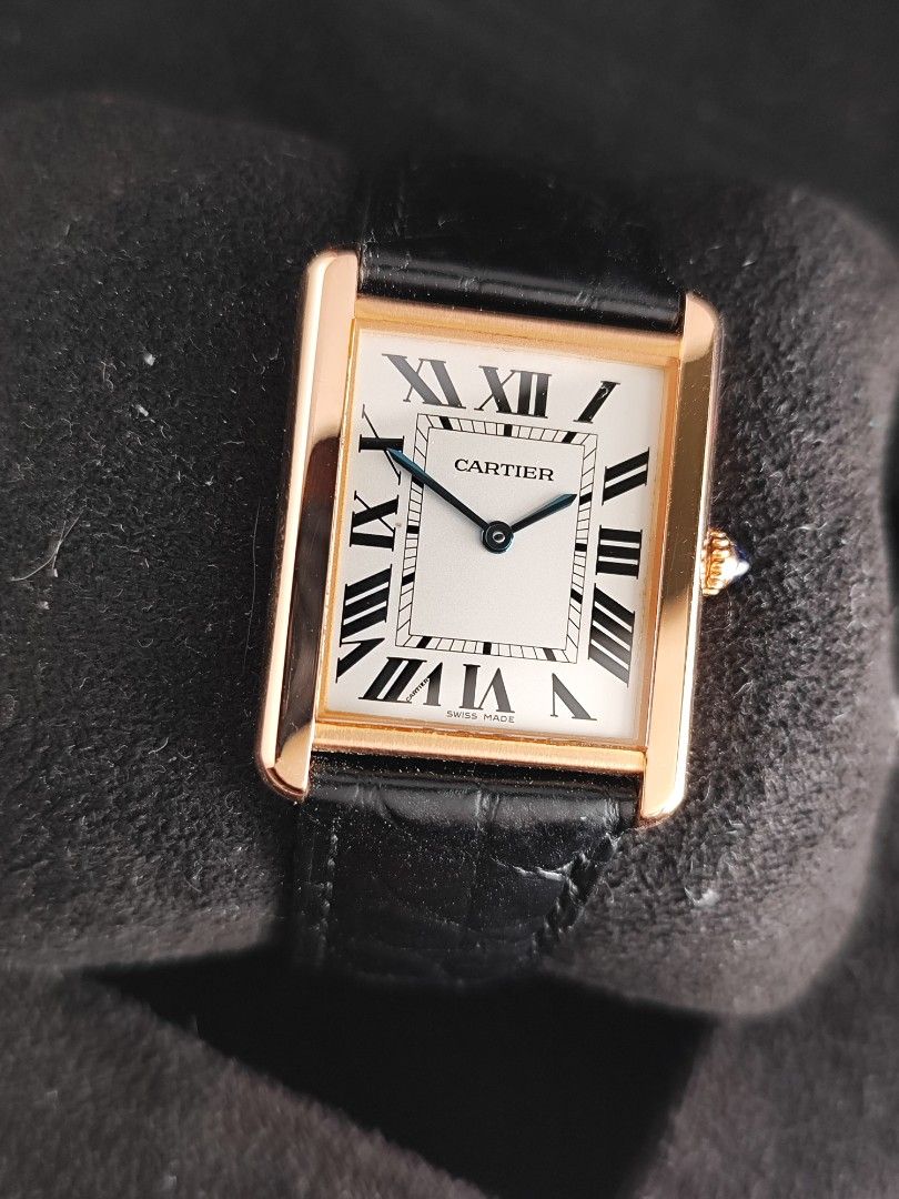 Cartier Tank Large Rose Gold (Category: Luxury Watches) located in San Juan City. Submitted by MW_888 (Listing ID 1442948052, Image 3). Description: 2015 Cartier Tank Solo Large in 18k Rose Gold Ref 3167 Quartz 9/10 condition Inclusions: watch, leather strap with orig buckle, Cartier guarantee card and orig box *photo reference on 6.5" wrist *buckle is YG (almost same shade as RG) *can be worn by both men and women 345k.