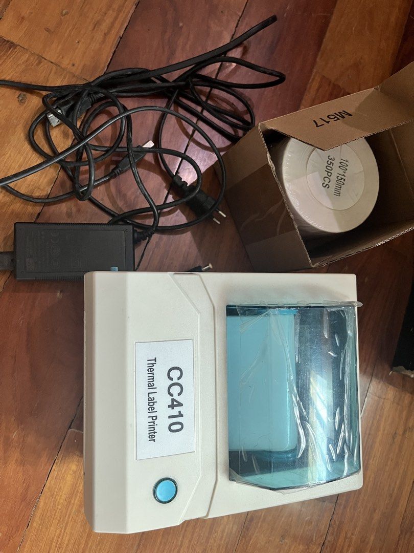 CC410 Thermal Label Printer with Power Adapter and Labels (Category: Printers, Scanners & Copiers) located in Quezon City. Submitted by simplethingsph (Listing ID 1442974880, Image 1). Description: - CC410 Thermal Label Printer - Includes Power Adapter and Cable - Comes with 1 Roll of 350 pcs 100x150mm Labels - Ideal for Shipping Labels and Product Tags - Easy Label Loading - Tested and Works Well negotiable … driver used is from XPRINTER . can s