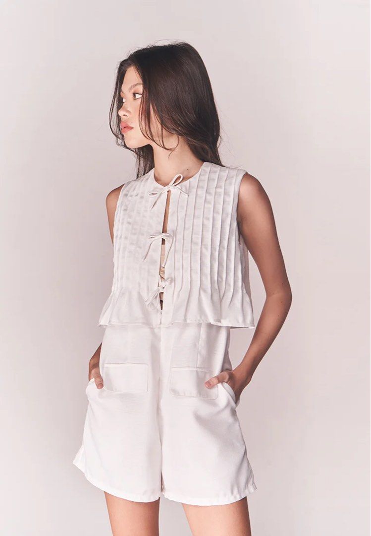 Sleeveless Top and Shorts Set (Category: Rompers) located in Caloocan City. Submitted by geenfinity (Listing ID 1443062692, Image 3). Description: Plains and Prints White Code Claude Sleeveless Jumpsuit/Playsuit (Off-white) Great for casual fits! • Round neck • Front tie closure • Front hidden-zip closure • Pleated top • Wide leg • Side seam pockets • Fully lined • Above the knee length.