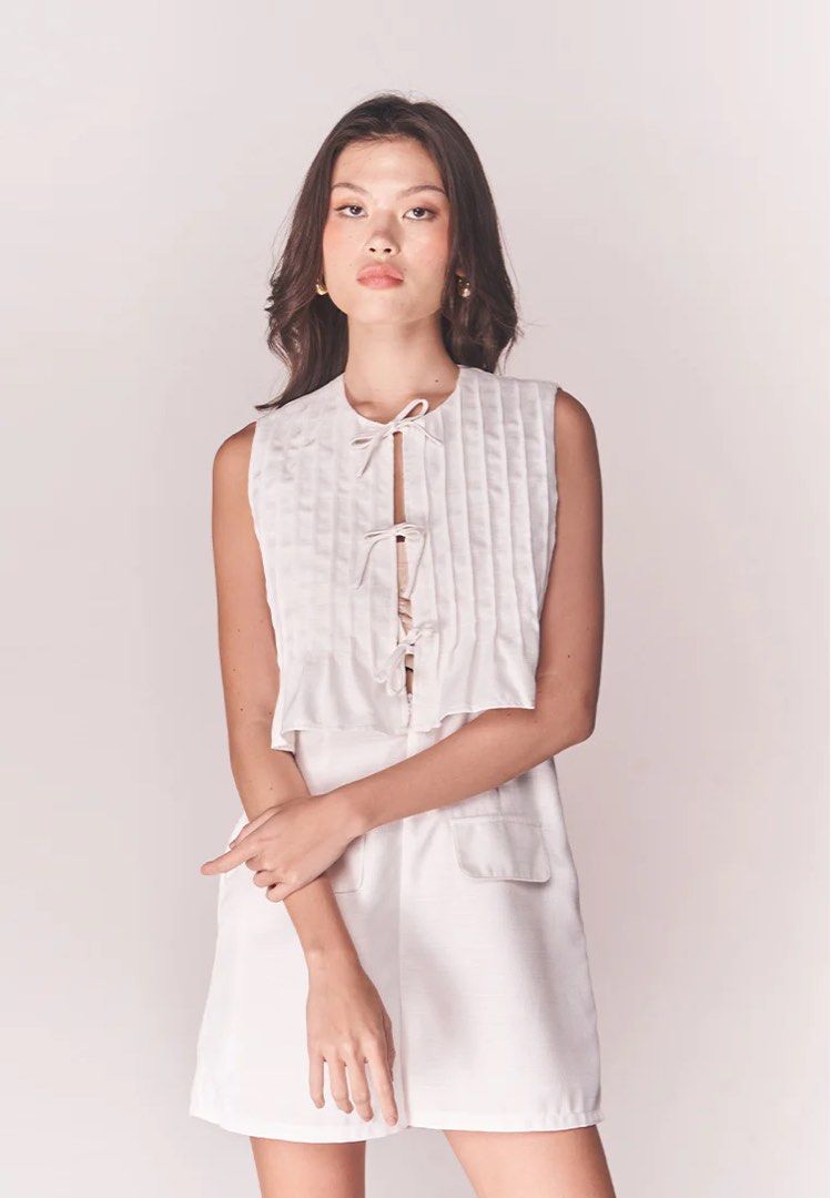 Sleeveless Top and Shorts Set (Category: Rompers) located in Caloocan City. Submitted by geenfinity (Listing ID 1443062692, Image 2). Description: Plains and Prints White Code Claude Sleeveless Jumpsuit/Playsuit (Off-white) Great for casual fits! • Round neck • Front tie closure • Front hidden-zip closure • Pleated top • Wide leg • Side seam pockets • Fully lined • Above the knee length.