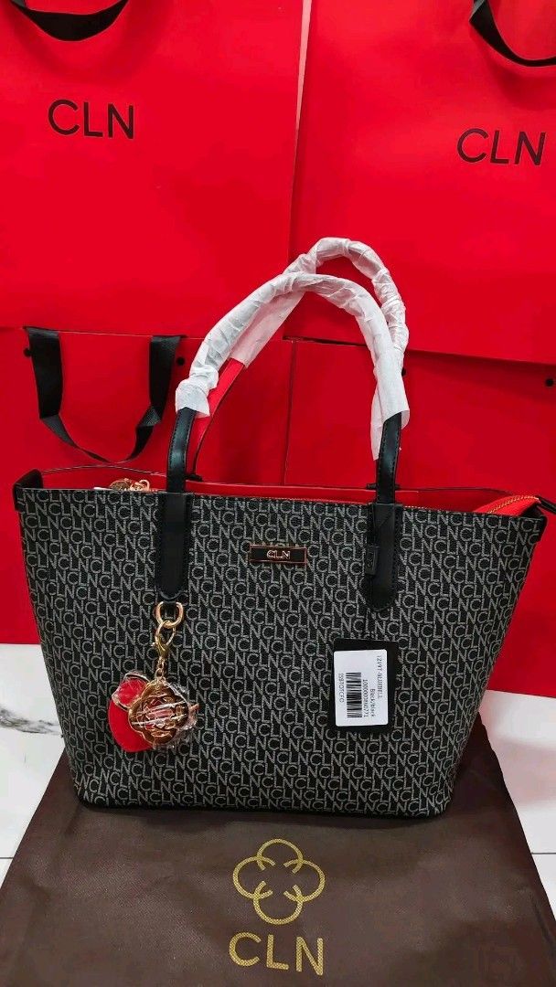 CLN Black Monogram Shoulder Bag with Gold Chain (Category: Shoulder Bags) located in Manila. Submitted by cassy0597 (Listing ID 1442973454, Image 2). Description: - CLN black shoulder bag - All-over CLN monogram pattern - Gold chain strap - Comes with dust bag - Ideal for everyday use or nights out.