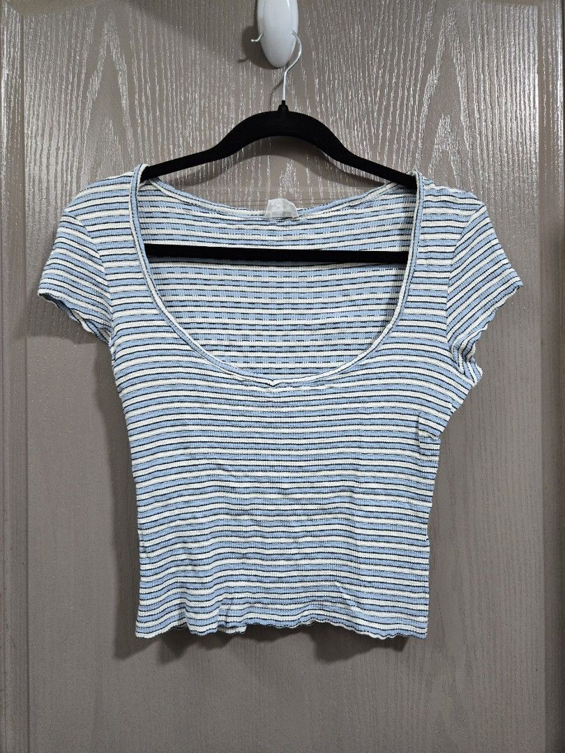 Cotton On Striped Ribbed Mock Neck Top (Category: Sleeveless) located in Rizal. Submitted by marrenkeithly (Listing ID 1443081665, Image 1). Description: - Blue and white striped top from Cotton On - Ribbed texture - Mock neck - Estimated size M - Versatile for layering or standalone wear - Easily pairs with jeans or skirts.