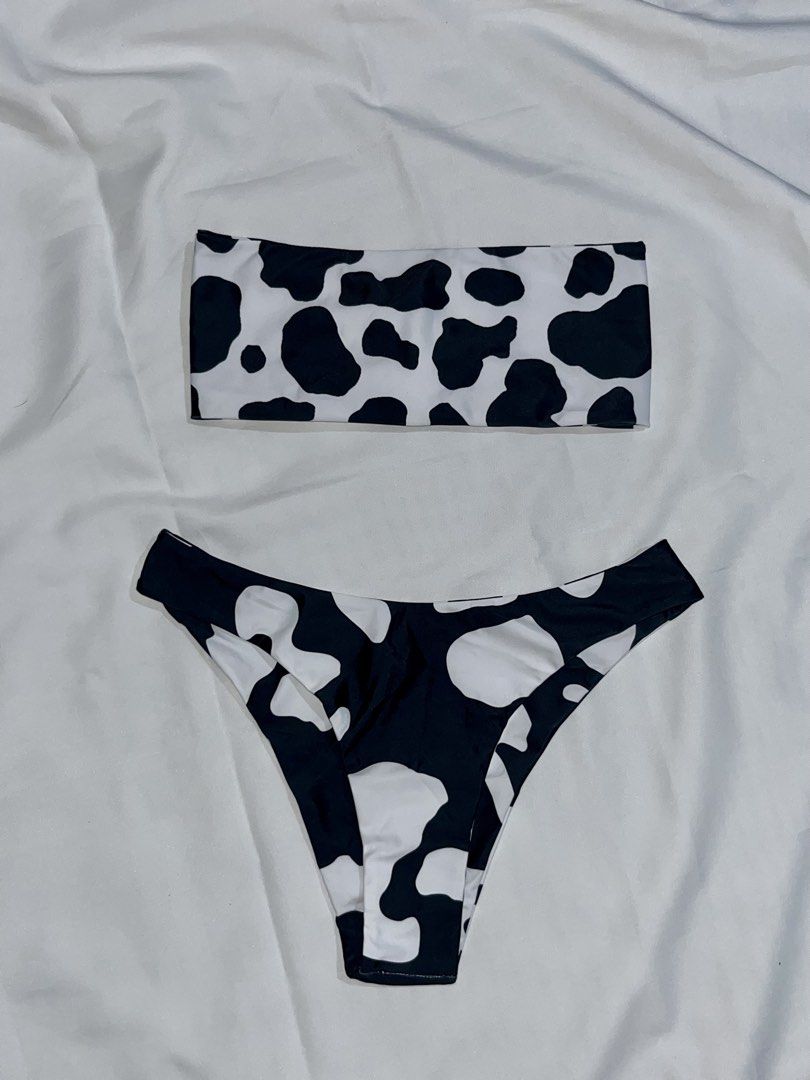 Cow Print Bandeau Bikini Set (Category: Bikinis & Swimsuits) located in Cavite. Submitted by prelovedby.zin (Listing ID 1443052441, Image 1). Description: - Small to Medium - Used once (Top) - Adorable cow print bikini set - Bandeau style top - Matching high-waisted bottoms - Stretchy and comfortable material - Perfect for beach or pool days - Embrace those summer vibes!.