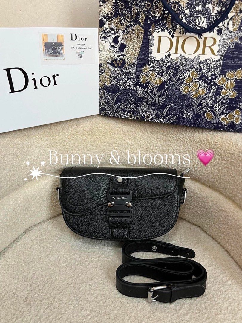 Dior Saddle Bag Black & Blue Oblique (Category: Luxury Bags & Wallets) located in Paranaque City. Submitted by madz_44444 (Listing ID 1443056557, Image 3). Description: - Dior Saddle Bag - Available in Black and Blue Oblique Canvas - Signature CD Buckle - Adjustable Strap Included - Ideal for carrying essentials - Versatile for day or night use -include dustbag receipt and box .