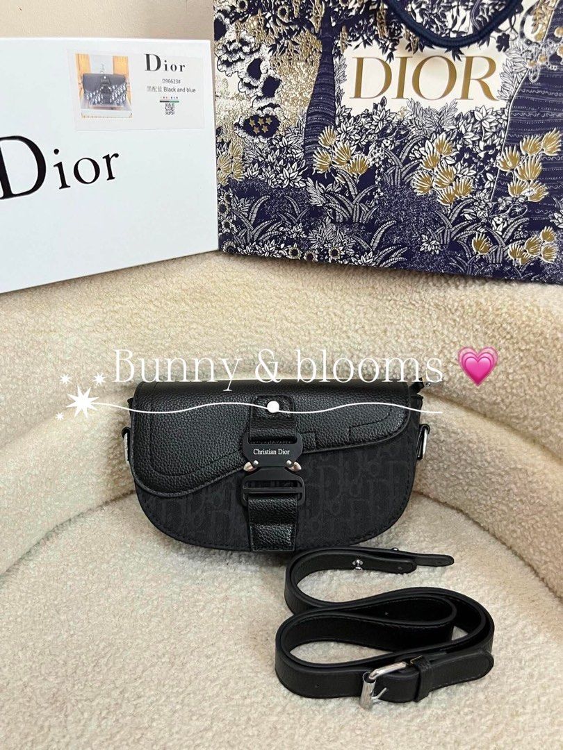 Dior Saddle Bag Black & Blue Oblique (Category: Luxury Bags & Wallets) located in Paranaque City. Submitted by madz_44444 (Listing ID 1443056557, Image 2). Description: - Dior Saddle Bag - Available in Black and Blue Oblique Canvas - Signature CD Buckle - Adjustable Strap Included - Ideal for carrying essentials - Versatile for day or night use -include dustbag receipt and box .