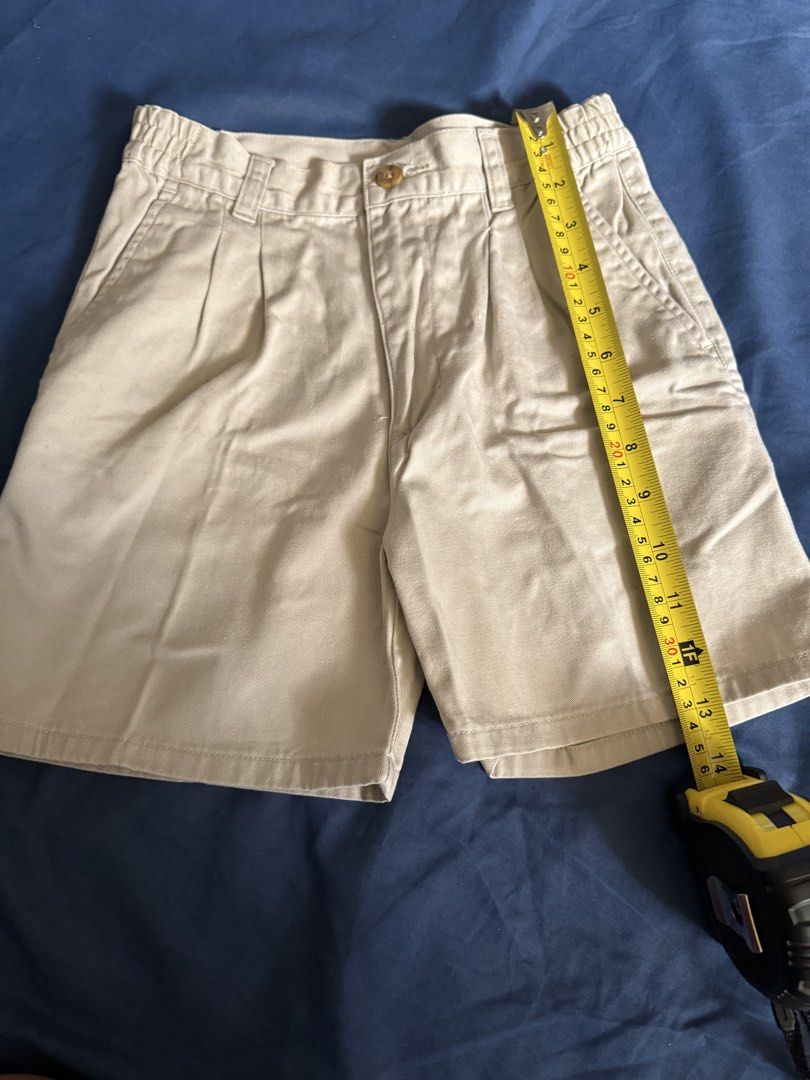 Duck Head Khaki Pleated Shorts (Category: Babies & Kids Fashion) located in Bulacan. Submitted by emjay_17 (Listing ID 1443004425, Image 3). Description: - Classic khaki shorts from Duck Head - Features pleated front - Elastic waistband for comfort - Two side pockets and one back pocket - Versatile for casual or smart-casual outfits - Measurements available in photos.