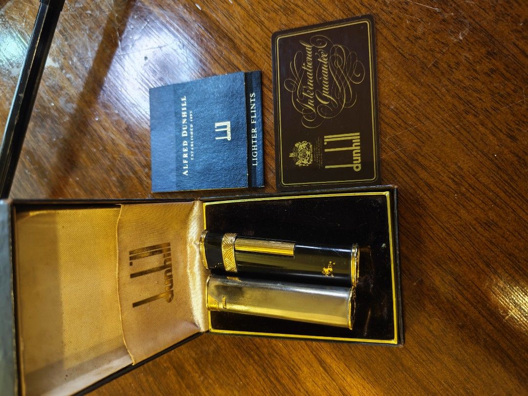Dunhill Petrol lighter (Category: Luxury Accessories) located in San Miguel. Submitted by mharly0221 (Listing ID 1442958498, Image 2). Description: This is a vintage gold-plated Dunhill petrol lighter, likely featuring engine-turned decoration. The base is marked with the Dunhill name, patent number 3810750, and design patent number 235456. Authentic vintage Dunhill lighters often feature a two-letter date code system, which can be verified to de