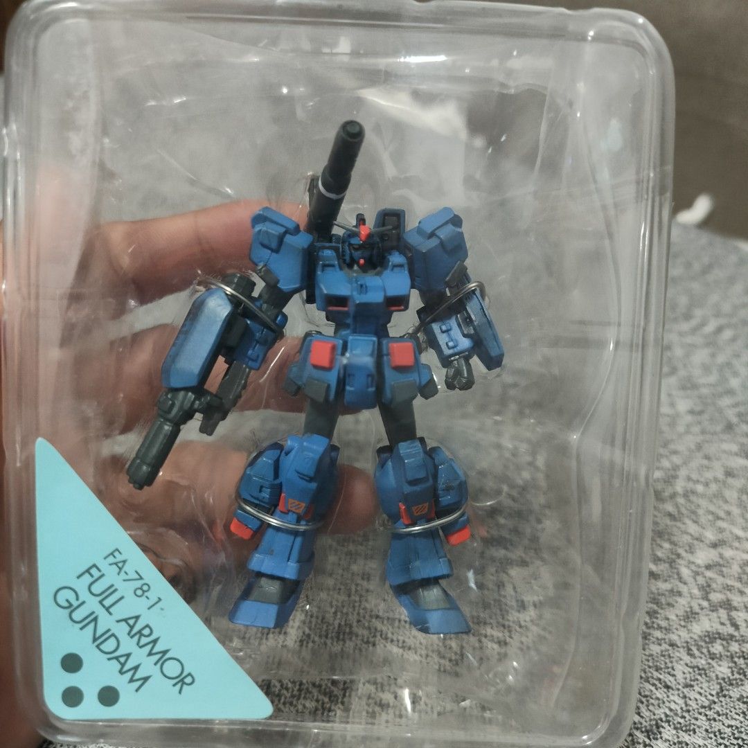 FA-78-1 Full Armor Gundam Figure (Category: Gundam & Model Kits) located in Plaridel. Submitted by klayskolektibols (Listing ID 1443052594, Image 1). Description: - Full Armor Gundam FA-78-1 figure - Comes in original plastic packaging - Striking blue and red color scheme - Equipped with a large cannon - Ideal for any Gundam enthusiast or collector.