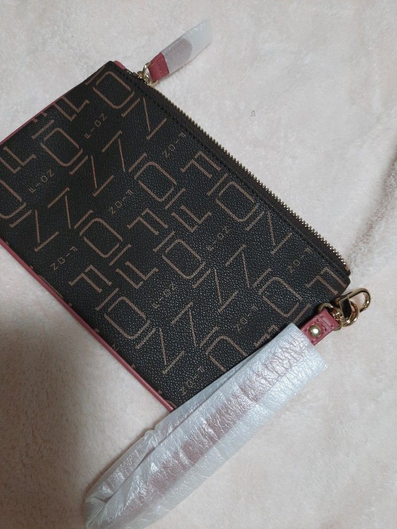 Fion Wristlet (Category: Purses & Pouches) located in Singapore. Submitted by pippa888 (Listing ID 1443045708, Image 3). Description: Size about 8x5inch .