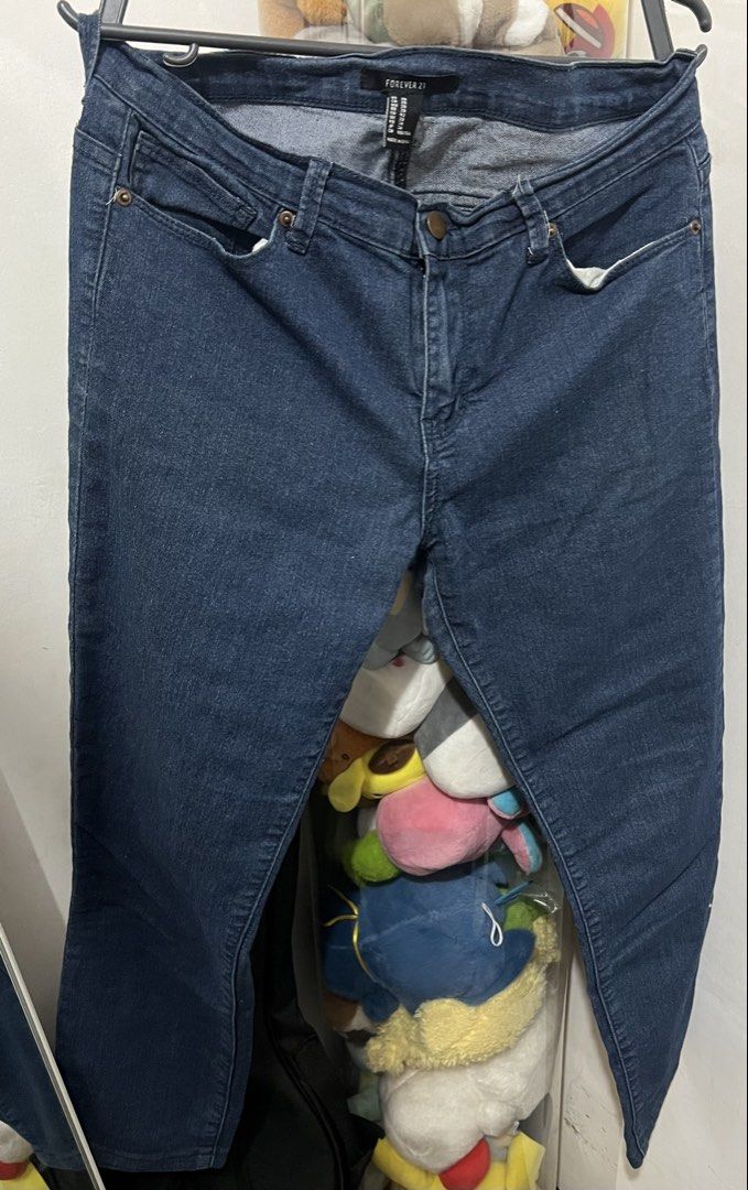 Forever 21 Dark Wash Denim Jeans (Category: Jeans) located in Pasig City. Submitted by nianaaa_ (Listing ID 1443106163, Image 1). Description: S-M - Brand: Forever 21 - Color: Dark Wash Denim - Style: Classic Five-Pocket - Closure: Button and Zip - Fit: Straight Leg - Perfect for: Everyday wear, easy to pair with any top.