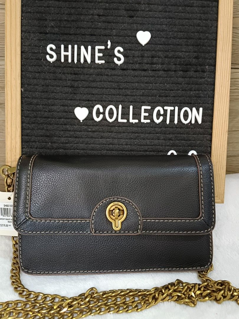Fossil Black Leather Chain Crossbody Bag (Category: Cross-body Bags) located in Quezon City. Submitted by shinereign (Listing ID 1443021976, Image 2). Description: - Fossil black leather crossbody bag - Gold-tone chain strap - Secure turn-lock closure - Stylish stitching detail on front flap - Compact size, ideal for carrying essentials - Brand new with original tags and Fossil card.