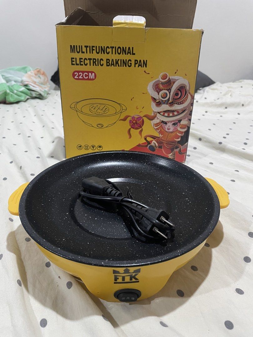 FTK Multifunctional Electric Baking Pan 22CM (Category: Bakeware) located in Manila. Submitted by anttann (Listing ID 1442975084, Image 2). Description: Yellow electric baking pan, 22cm. Non-stick, easy to use with one switch. Perfect for quick meals and snacks. Includes power cord and box..