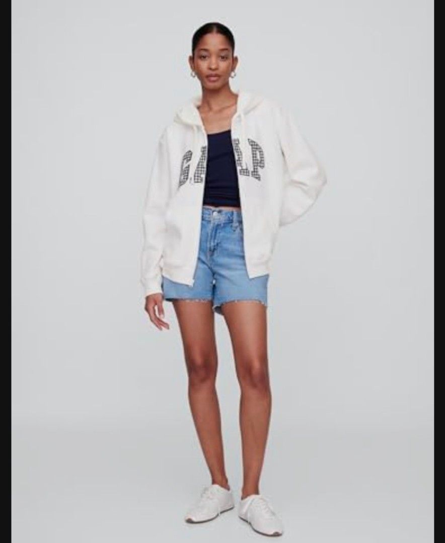 GAP White Zip-Up Hoodie with Gingham Logo (Category: Coats, Jackets and Outerwear) located in Quezon City. Submitted by shinereign (Listing ID 1443020627, Image 2). Description: - White GAP zip-up hoodie - Features classic GAP logo in navy and white gingham - Long sleeves and hood - Super comfy and casual - Great for everyday wear - Easy to pair with jeans or shorts.