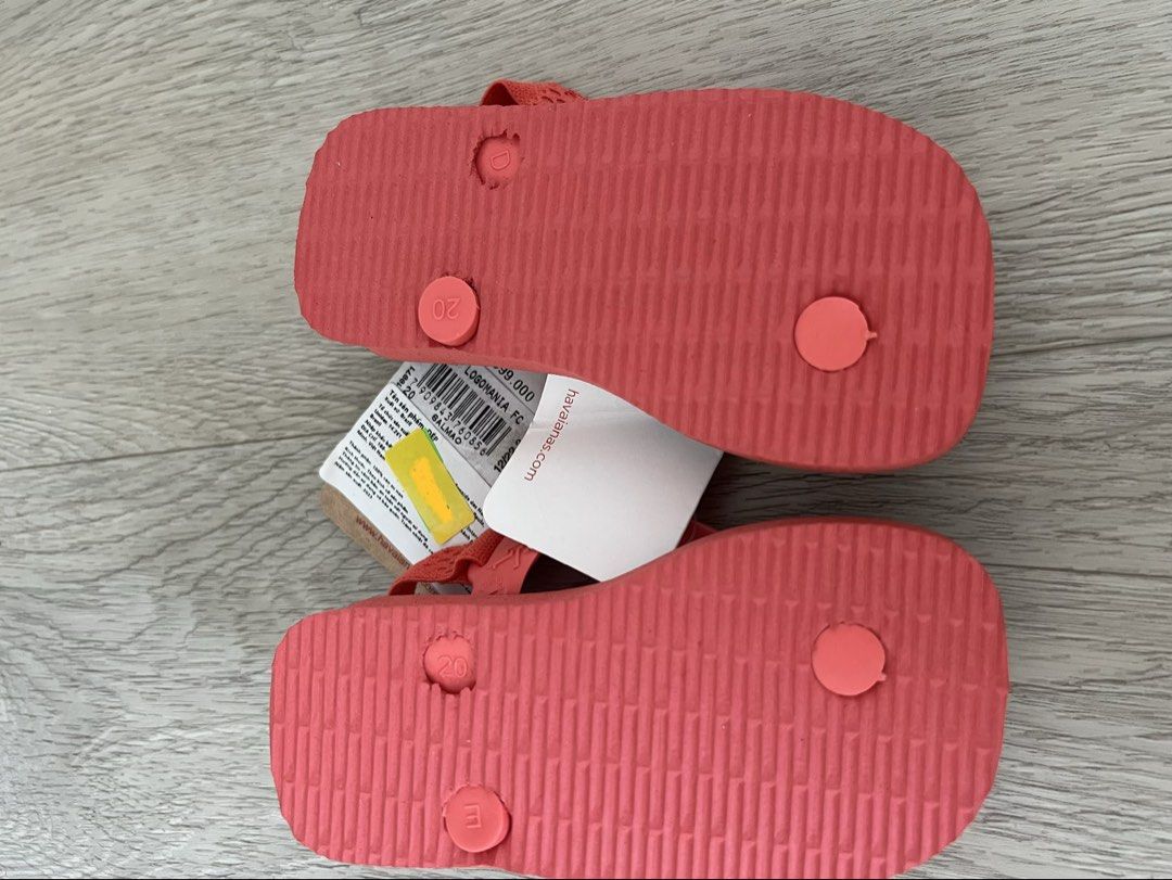 Havaianas Kids Flip-flops with Strap (Category: Babies & Kids Fashion) located in Singapore. Submitted by forever_yong (Listing ID 1443053718, Image 2). Description: - Havaianas flip-flops for kids - Colour: Purple and coral pink - Features a secure back strap - Ideal for beach or pool days - Size: 6C / 22 EUR - Brand new with original tags attached.