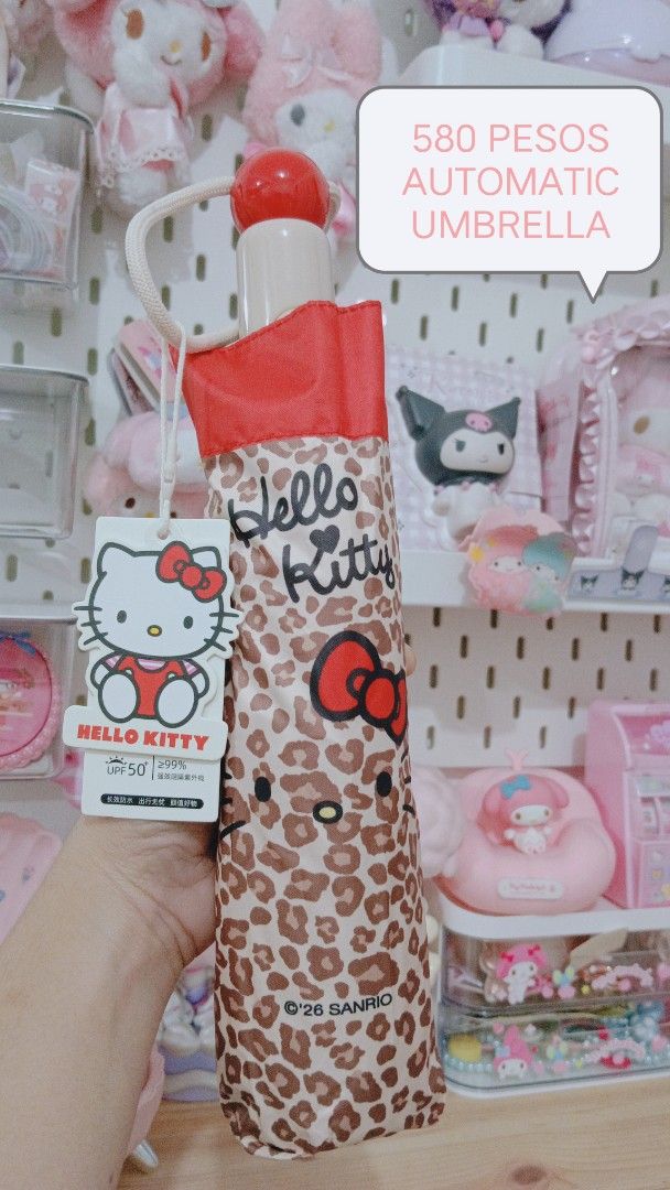 Hello Kitty Leopard Print Automatic Umbrella (Category: Umbrellas) located in Manila. Submitted by masterlei (Listing ID 1443060139, Image 1). Description: - Adorable Kitty design with a stylish leopard print. - Automatic umbrella for effortless opening and closing. - Versatile for both rainy and sunny days. - A must-have accessory for any Kitty enthusiast!.