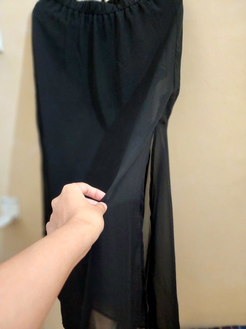 H&M Sheer Skirt for Beach (Category: Skirts) located in Mandaluyong City. Submitted by aaa25 (Listing ID 1443039420, Image 3). Description: - Black sheer long skirt from H&M Divided - Style to wear on the beach - High slit on the side - Flowy and light material - Size S to M.