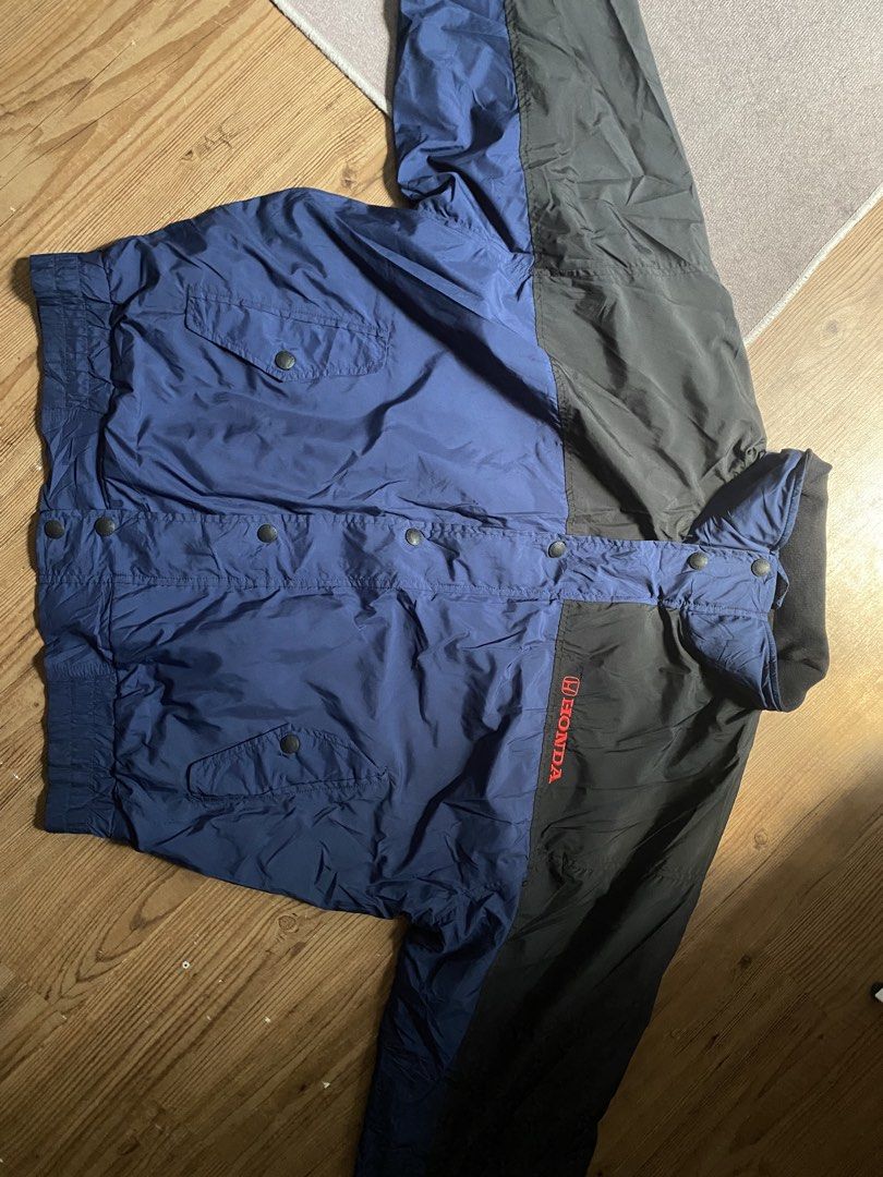 Honda Mark One Racing Jacket Blue Black Size L (Category: Coats, Jackets and Outerwear) located in Manila. Submitted by avrilarqu43176 (Listing ID 1442980146, Image 1). Description: - Cool Honda racing jacket - Color: Blue and Black - Brand: Mark One - Size: L - Features Honda logo on chest - Snap button closure - Ribbed cuffs and hem - Ideal for Honda enthusiasts or racing jacket lovers.