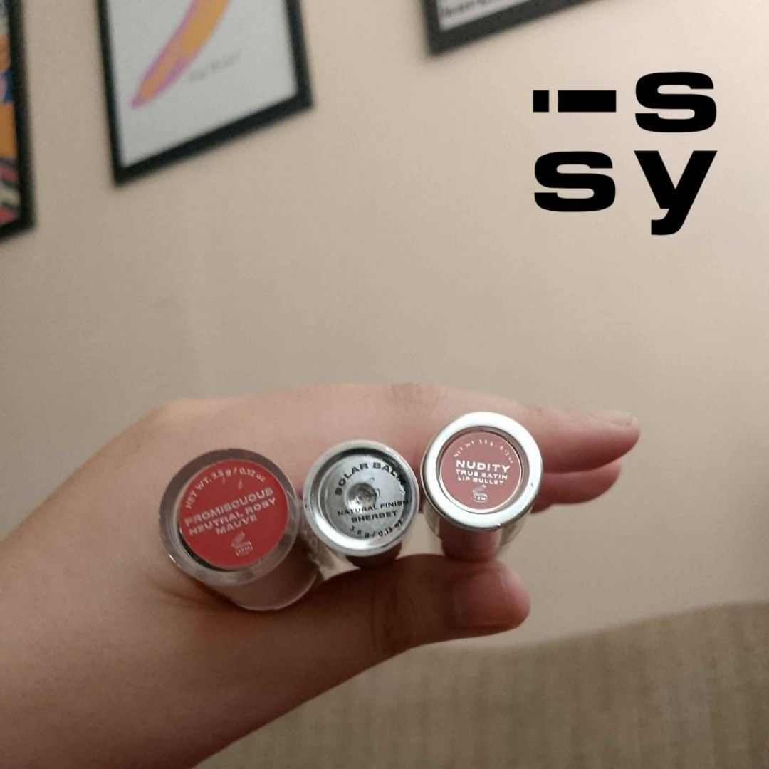 ISSY Lippie Bundle (Category: Makeup) located in Manila. Submitted by gabasta998 (Listing ID 1442963399, Image 2). Description: 2 Issy, 1 Issy and co (old) -Issy Promiscuous Neutral Mauve (60-70% left) with crack sa lid -Issy and co Solar Balm (80% left) fadings sa exterior -Issy Nudity True Satin (80% left) *actual photo posted NOTE: EVERYTHING IM SELLING ARE PRELOVED UNLESS INDICATED. EVERYTHING BOUGHT POST-PANDEMIC (2022-PRESENT) MEANING, SOME