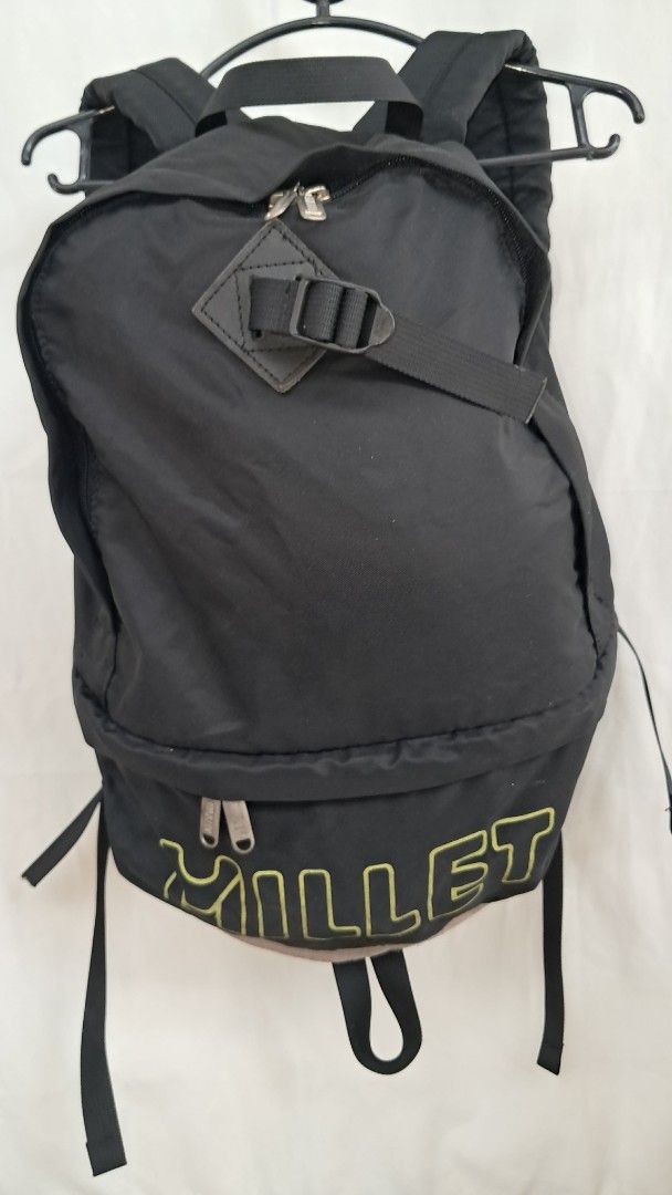 Japan Millet Black Backpack MADE IN KOREA (Category: Backpacks) located in Bulacan. Submitted by amarijapansurplus (Listing ID 1443122963, Image 1). Description: - Millet backpack with signature logo on front pocket. - Adjustable straps for a comfortable fit. - Ideal size for day trips or carrying daily essentials. - Zippers are in good working condition. - Shows some light wear on the beige bottom section. 📌as is 📌What u see is what u get 📌Fi