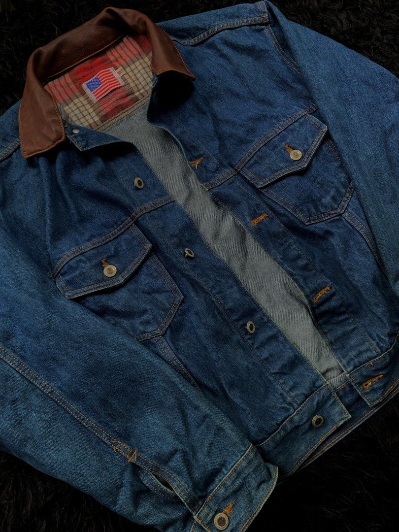 JIHYU JEANS Denim Jacket with Brown Collar (Category: Coats, Jackets and Outerwear) located in Manila. Submitted by 0thrift_n_isaw (Listing ID 1443122473, Image 2). Description: - Classic blue denim jacket - Features a stylish brown collar - Cozy plaid lining for added warmth and style - Two chest pockets with secure button closures - Easy button-up front - Versatile for layering over any outfit - A timeless piece that pairs well with everything.