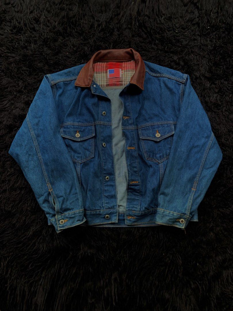 JIHYU JEANS Denim Jacket with Brown Collar (Category: Coats, Jackets and Outerwear) located in Manila. Submitted by 0thrift_n_isaw (Listing ID 1443122473, Image 1). Description: - Classic blue denim jacket - Features a stylish brown collar - Cozy plaid lining for added warmth and style - Two chest pockets with secure button closures - Easy button-up front - Versatile for layering over any outfit - A timeless piece that pairs well with everything.