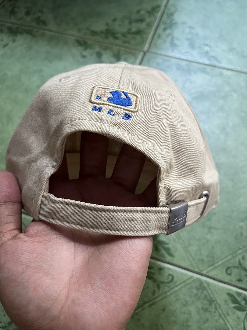 LA Dodgers Baseball Cap MLB Tan Blue (Category: Caps & Hats) located in Quezon City. Submitted by flip_da_cash (Listing ID 1442989860, Image 3). Description: - Tan baseball cap - Blue LA Dodgers logo - MLB branding on back and inside - Adjustable strap for a custom fit - Perfect for casual wear or showing team pride - Clean and ready for its new owner.