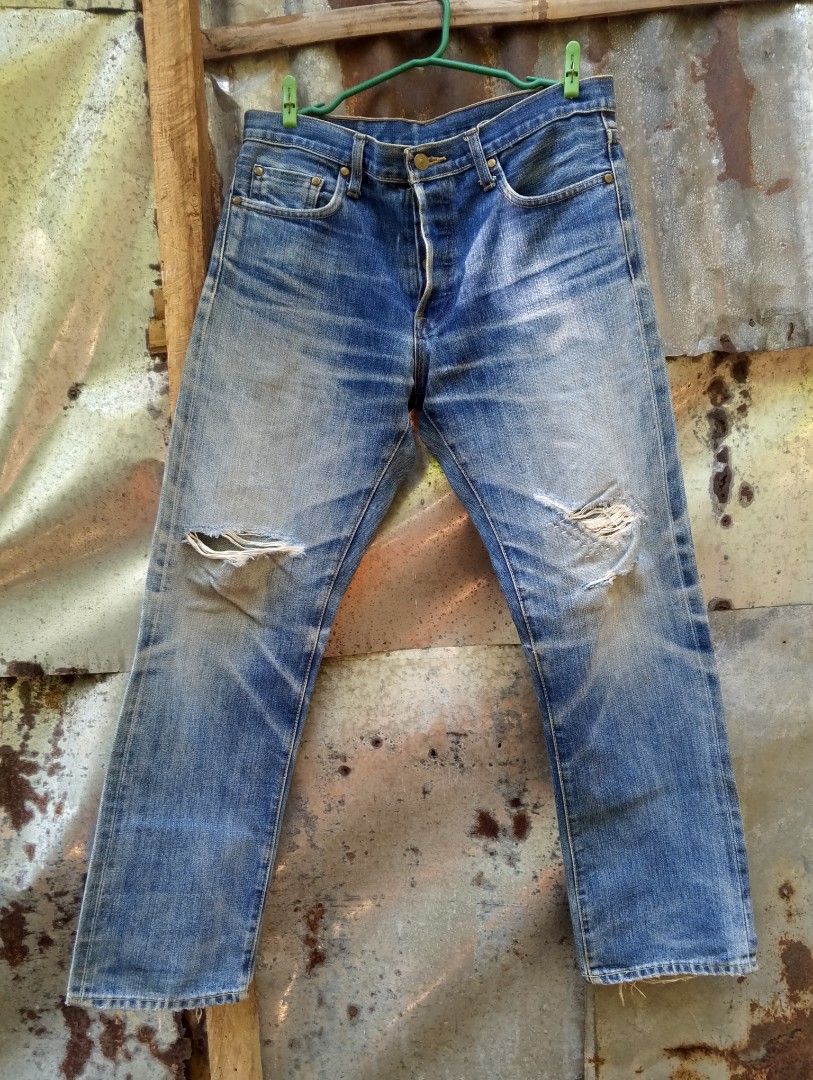 Levi's 501xx Big EButton Fly Distressed Denim Jeans (Category: Jeans) located in Taguig. Submitted by lil_dice (Listing ID 1442940219, Image 1). Description: - Classic Levi's 501 jeans - Button fly closure - Distressed look with knee rips - Faded blue wash with whiskering - Straight leg fit Levi's 501xx Selvedge denim .