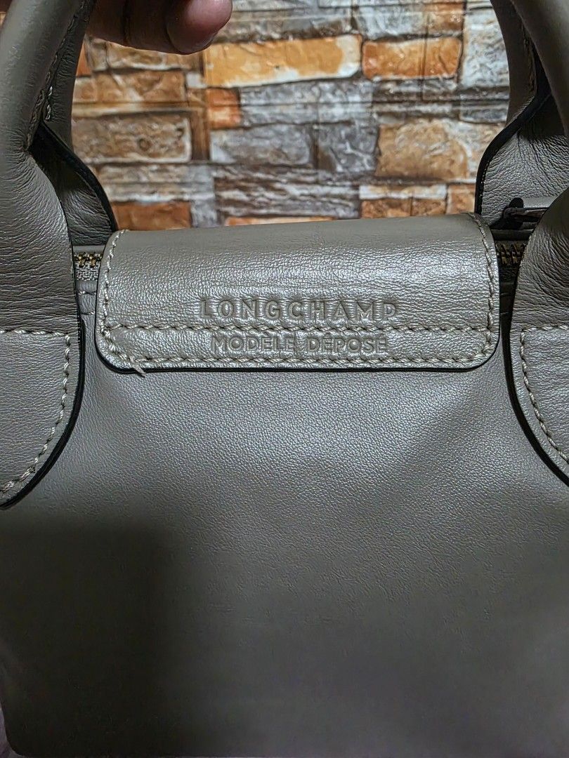 [SALE] Longchamp mini leather (Category: Shoulder Bags) located in Binan City. Submitted by elli.etcetera (Listing ID 1443060587, Image 3). Description: MOP: Gcash, Maya or Bank Transfer MOD: Flash, J&T orLalamove.