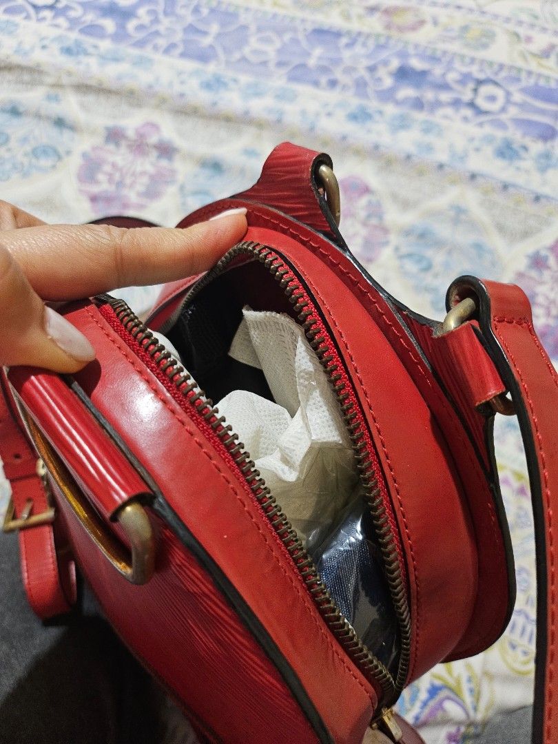 Louis Vuitton Epi Leather Red Shoulder Bag (Category: Luxury Bags & Wallets) located in Las Pinas. Submitted by swiftdragon_0c099a (Listing ID 1443081765, Image 3). Description: - Authentic Red Louis Vuitton Shoulder Bag - Material: Epi Leather - Closure: Zipper - Interior: still good conditions - Origin: Made in France all good conditions no inclusions no for swapping .