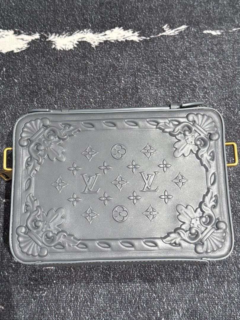 Louis Vuitton Grey Monogram Embossed Crossbody Bag (Category: Luxury Bags & Wallets) located in Caloocan City. Submitted by mightbagsph23 (Listing ID 1442994593, Image 1). Description: - Authentic Louis Vuitton crossbody bag - Classic monogram pattern embossed all over - Elegant gold hardware details - Adjustable strap for comfortable wear - Comes with original dust bag - Made in France - Ideal for everyday use.