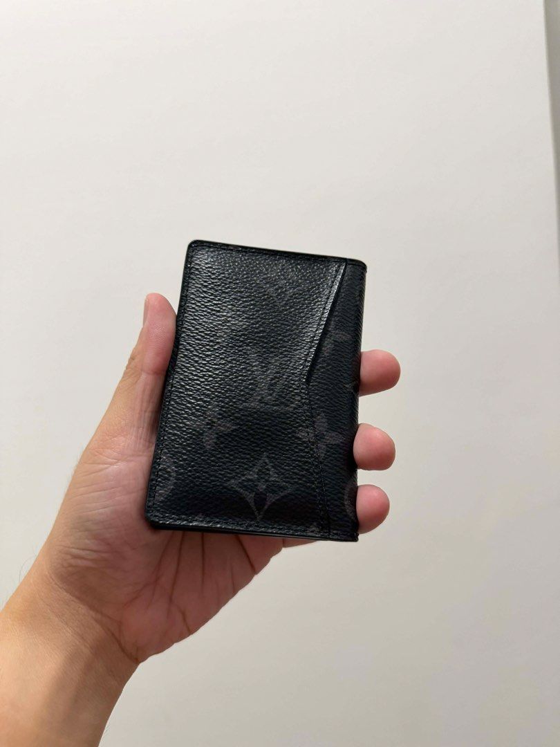 Louis Vuitton Monogram Card Holder Black (Category: Luxury Bags & Wallets) located in Makati City. Submitted by jelyss1 (Listing ID 1442962904, Image 2). Description: - Authentic Louis Vuitton Card Holder with receipt and paper bag - Color: Black Monogram Canvas - Monogram: Subtle and dark - Interior: Multiple card slots and central compartment - Personalization: Initials 'JDR' embossed inside- OPEN FOR NEGO! - Origin: Made in Spain - Feature: Pe