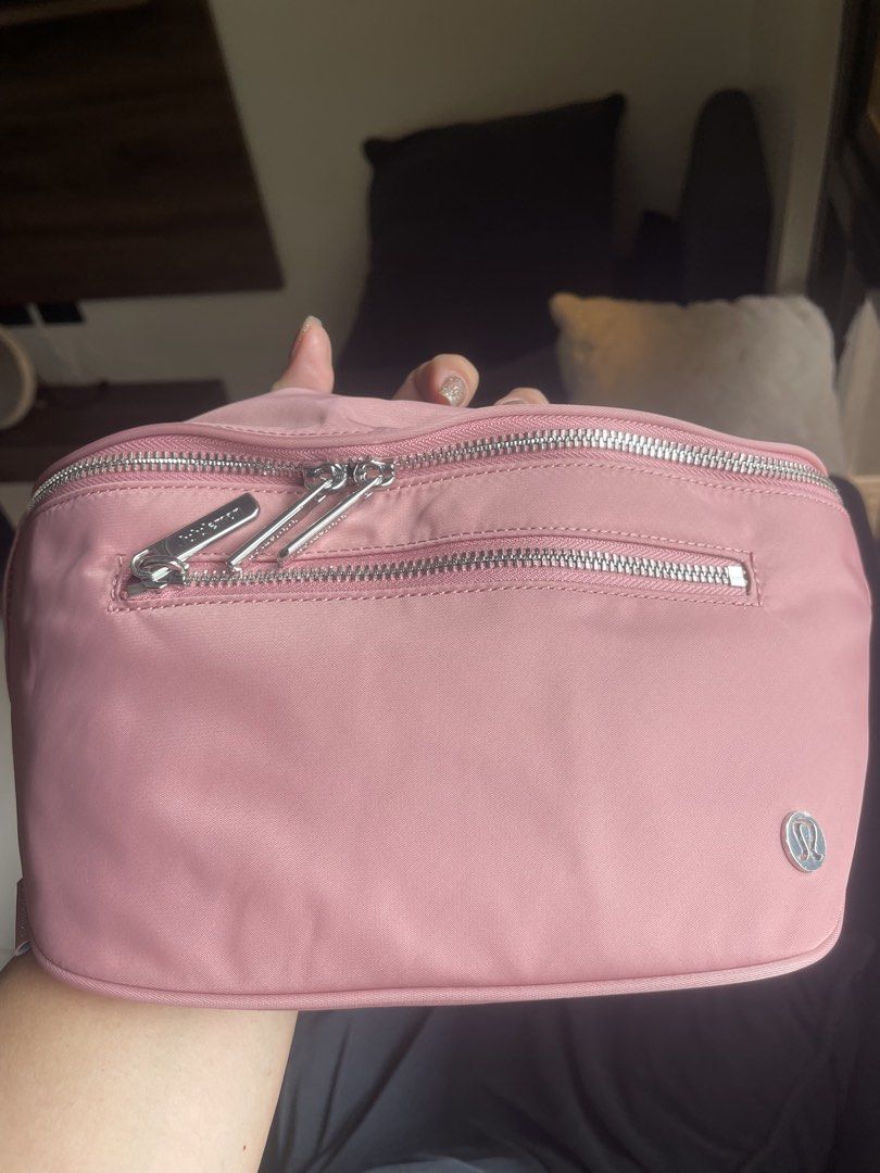Lululemon City Essentials Belt Bag Pink (Category: Cross-body Bags) located in Rizal. Submitted by gannda (Listing ID 1442943650, Image 1). Description: - Pink Lululemon belt bag - Iconic Lululemon logo on the front - Versatile wear: crossbody or around the waist - Ideal for everyday errands or travel adventures.