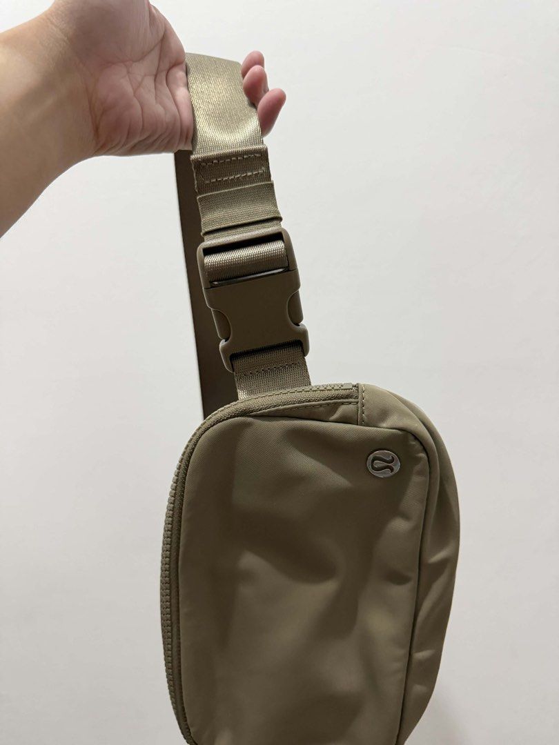 Lululemon Everywhere Belt Bag - Khaki (Category: Cross-body Bags) located in Makati City. Submitted by jelyss1 (Listing ID 1443088552, Image 2). Description: - Lululemon Everywhere Belt Bag - Color: Khaki - Water-repellent fabric - Main zipper pocket for essentials - Interior mesh pockets for organization - Adjustable strap for crossbody or waist wear - Ideal for everyday use and workouts.