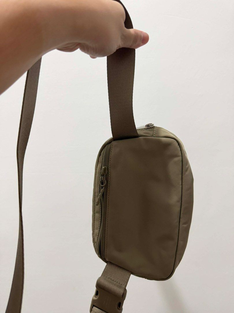 Lululemon Everywhere Belt Bag - Khaki (Category: Cross-body Bags) located in Makati City. Submitted by jelyss1 (Listing ID 1443088552, Image 3). Description: - Lululemon Everywhere Belt Bag - Color: Khaki - Water-repellent fabric - Main zipper pocket for essentials - Interior mesh pockets for organization - Adjustable strap for crossbody or waist wear - Ideal for everyday use and workouts.