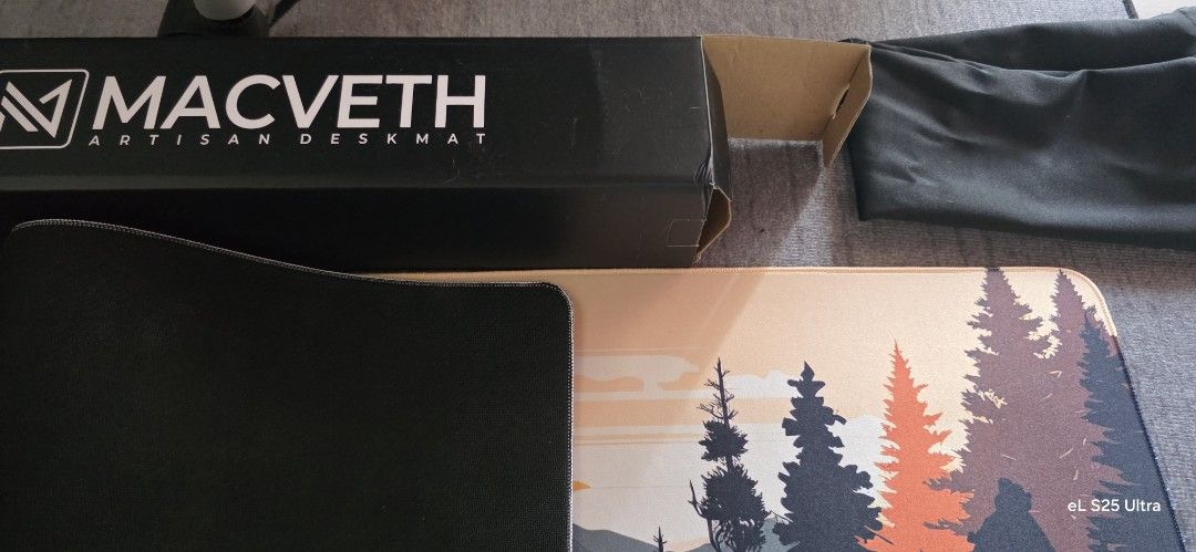 Macveth Artisan Desk Mat - Mountain Sunset Design (Category: Mouse & Mousepads) located in Marilao. Submitted by royalwind.7829fd (Listing ID 1442998871, Image 2). Description: - Macveth Artisan Desk Mat - Stunning mountain sunset landscape design - Comes with original box and pouch - Ideal for gaming setups or workspace - Dimensions: Approximately 90cm x 40cm - Reason for selling: No longer needed.